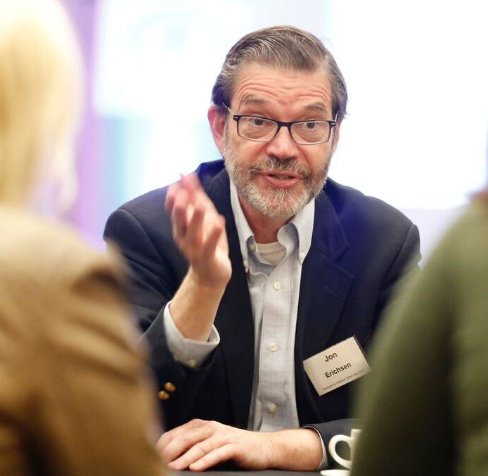 Jon Erichsen speaks with delegates at a Nystagmus Network Open Day.