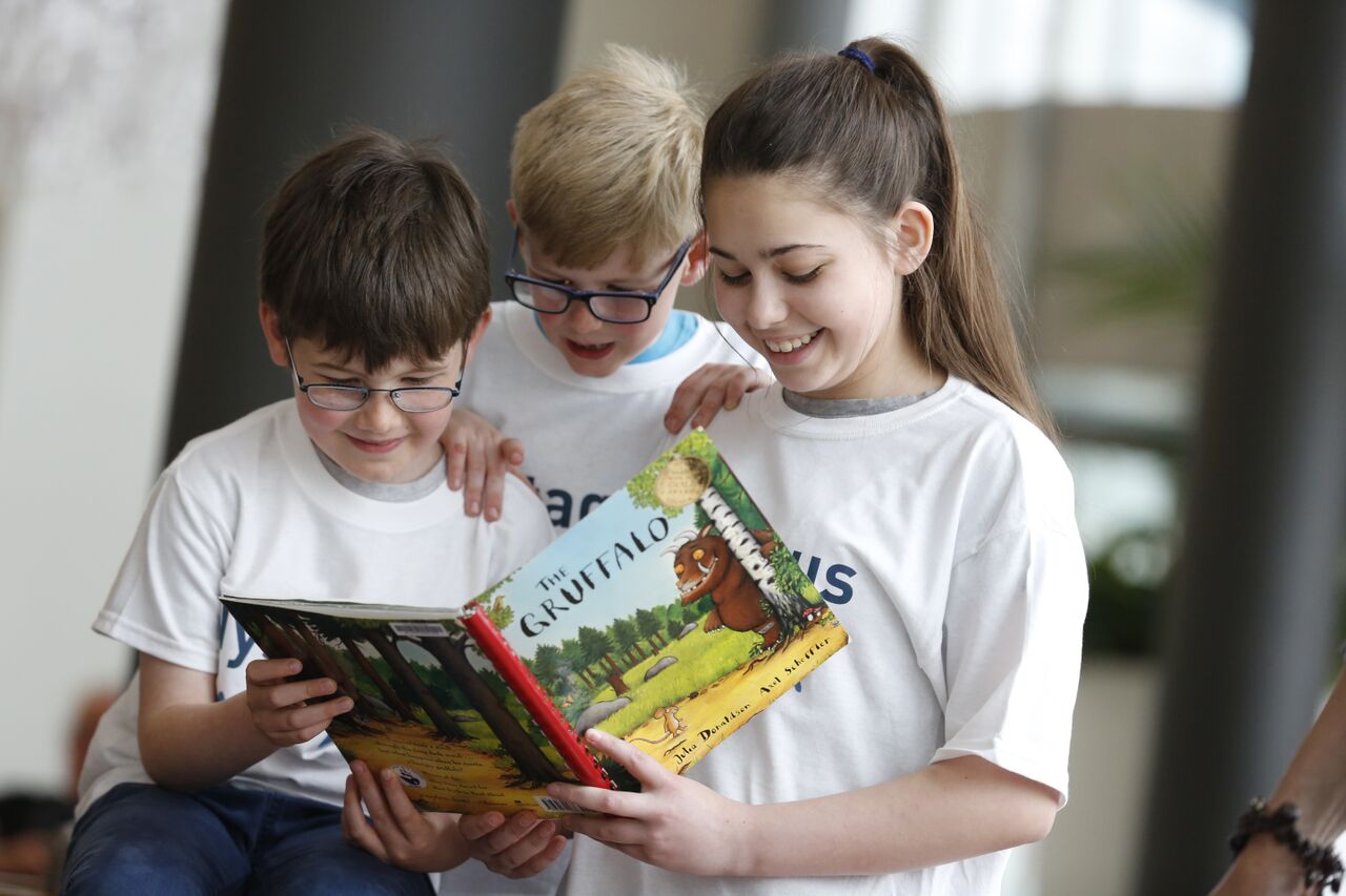 Children reading The Gruffalo.