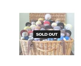 A basket of mascots and the words 'sold out'.