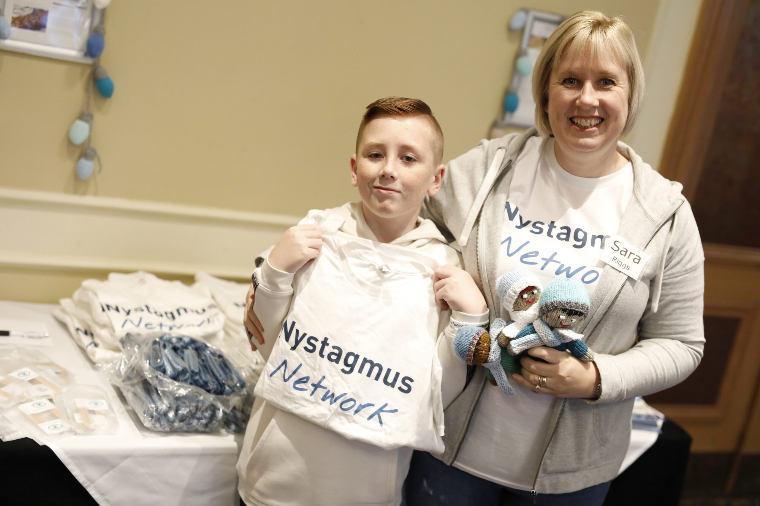 Sara and Charlie at the Nystagmus Network merchandise stall.