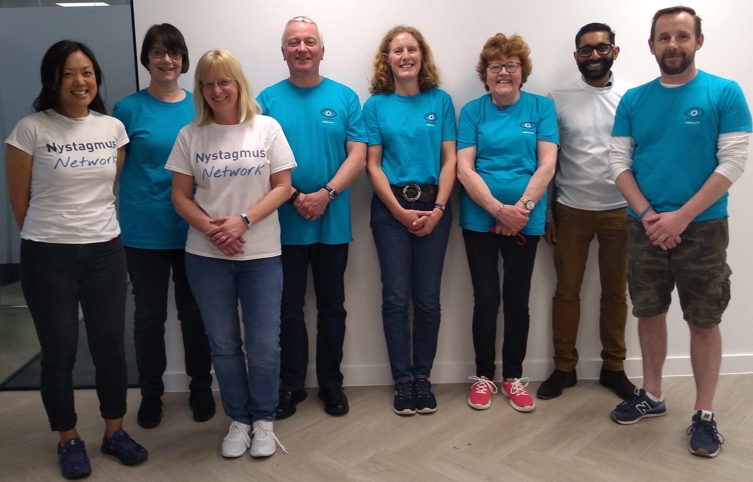 Trustees in their charity T-shirts.
