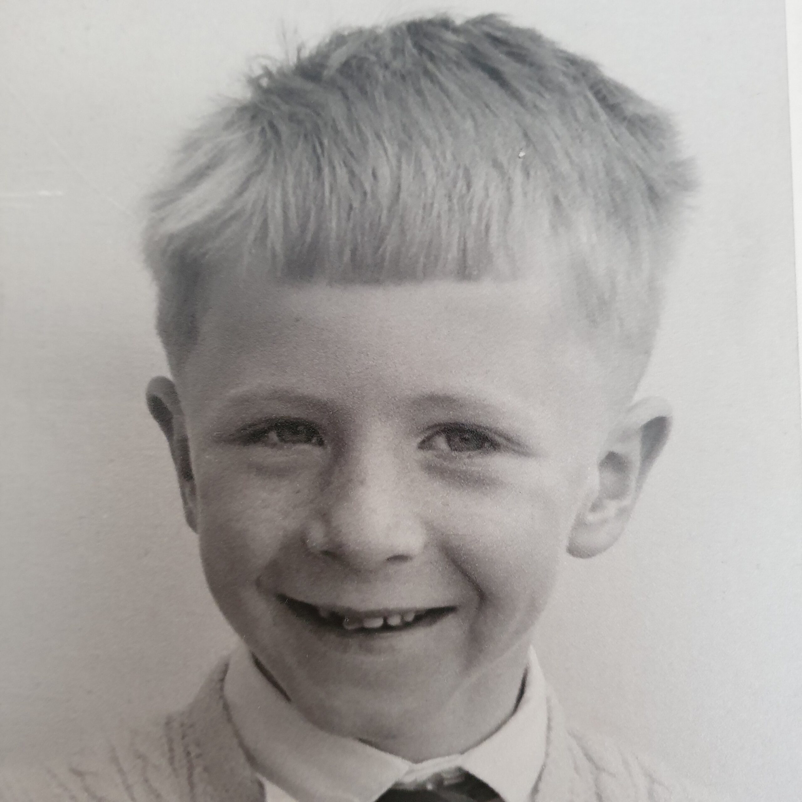 John aged around 8 - a black and white photo.