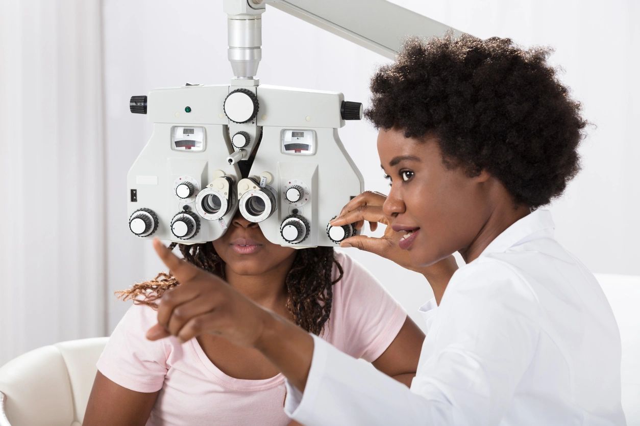 A person is undergoing a sight test in a clinic.