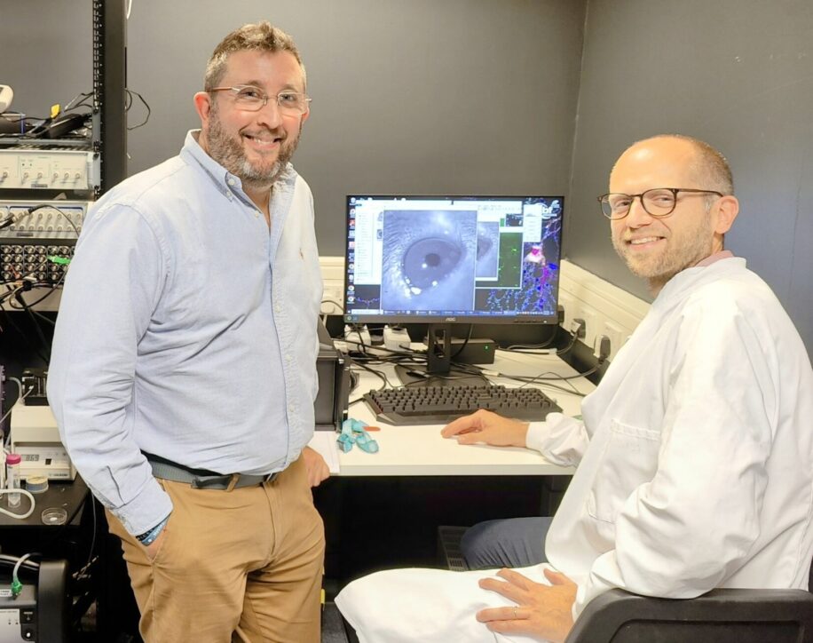 Nystagmus Network Trustee Paul Rose and Dr Matteo Rizzi from the UCL Institute of Ophthalmology, looking at images captured with their high-speed camera.
