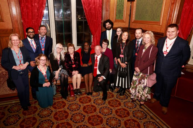 Marsha de Cordova MP sits among members of the Nystagmus Network team.