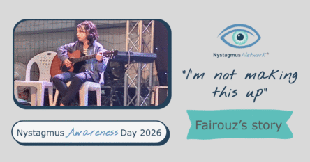 Fairouz is sitting on a stage playing her guitar.
